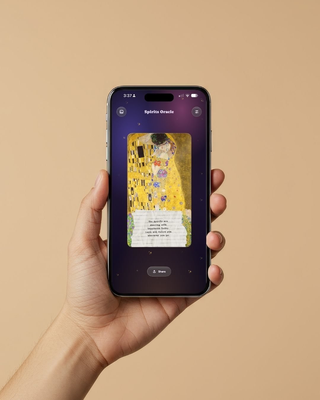 Hand holding an iPhone with the Spirits Oracle app open, showing a drawn card with Klimt's golden painting The Kiss and a fortune message on lined paper